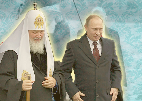 Russian President Vladimir Putin, right, walks with Russian Orthodox Patriarch Kirill, left, to place flowers at a statue of Minin and Pozharsky, the leaders of a struggle foreign invaders in 1612, to mark the National Unity Day in Moscow, on Nov. 4, 2013.