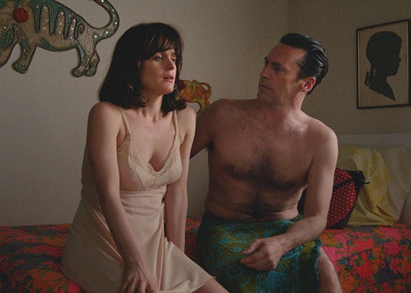 Elizabeth Reaser as Diana and Jon Hamm as Don Draper in Mad Men.  