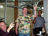 Executive Producer JJ Sutherland (middle) toasting the first broadcast with Slate Editor Jacob Weisberg  (left) and Day to Day  Editor John Buckley  (right) 