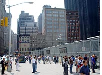 Tourists on Church Street with 114 Liberty in the background