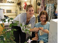 Farm girl training: Sarah (seated) knitting herself back together