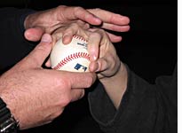 Bryan Price shows Eric the OK grip for a circle change