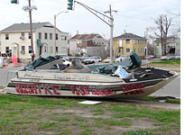 Student graffiti on a displaced boat at the University of New Orleans. 
Click image to expand.