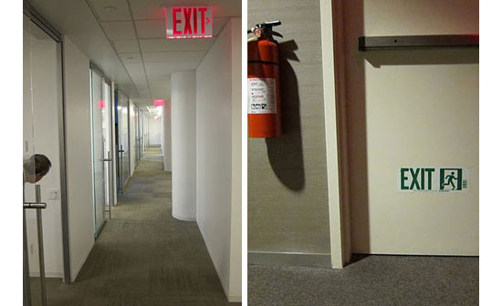 The Slate office is peppered with red exit signs, but the green man is apparent on the fire door, as recently required by New York City code. Click image to expand.