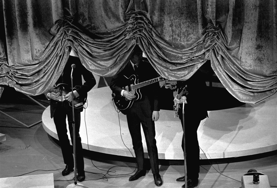 The curtain rises on the British singing group The Beatles, September 16, 1964, at a charity show in New York City.