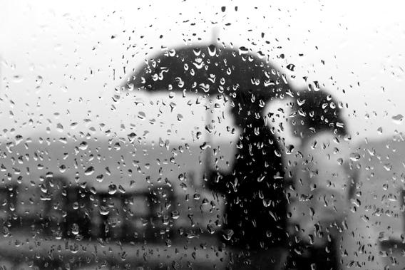 Couple walking in the rain.