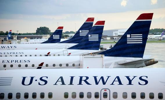 U.S. Airways planes sit on the tarmac at Charlotte/Douglas International Airport in September 2012 in Charlotte, North Carolina.