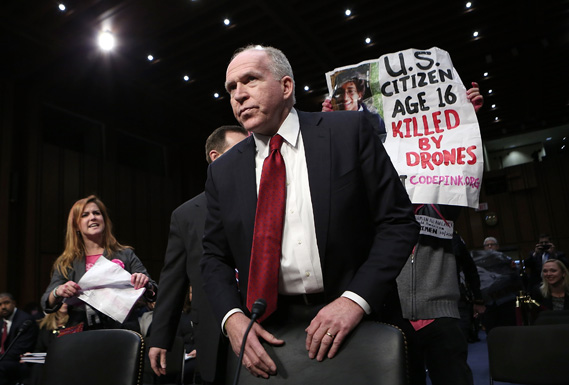 Anti-war protesters disrupt the start of a nomination hearing for U.S. Assistant to the President for Homeland Security and Counterterrorism John Brennan.