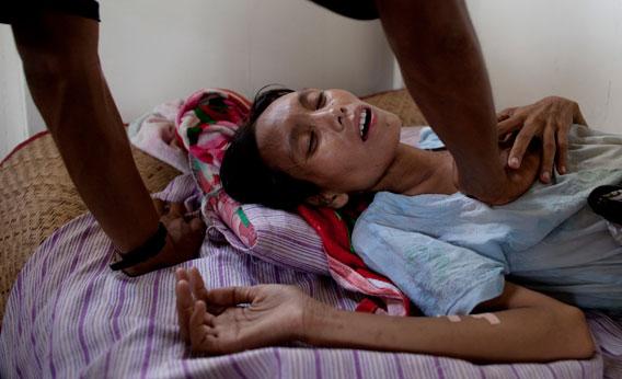 Ma Khin Lay, 29, lies on a bed at a special clinic for AIDS on April 29, 2009 in Yangon, Myanmar (Burma). 