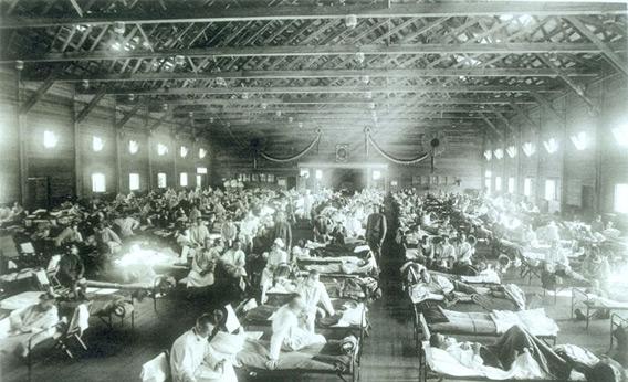 Historical photo of the 1918 Spanish influenza ward at Camp Funston, Kansas.