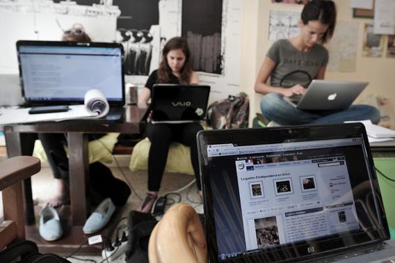 French students prepare their stories on Greek issues at a hostel in dowtown Athens on April 2, 2013.