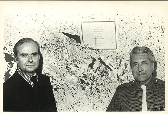 Waddell Gallery director R. H. Waddell and Van Hoeydonck seen with the NASA photograph showing the Fallen Astronaut and plaque. 