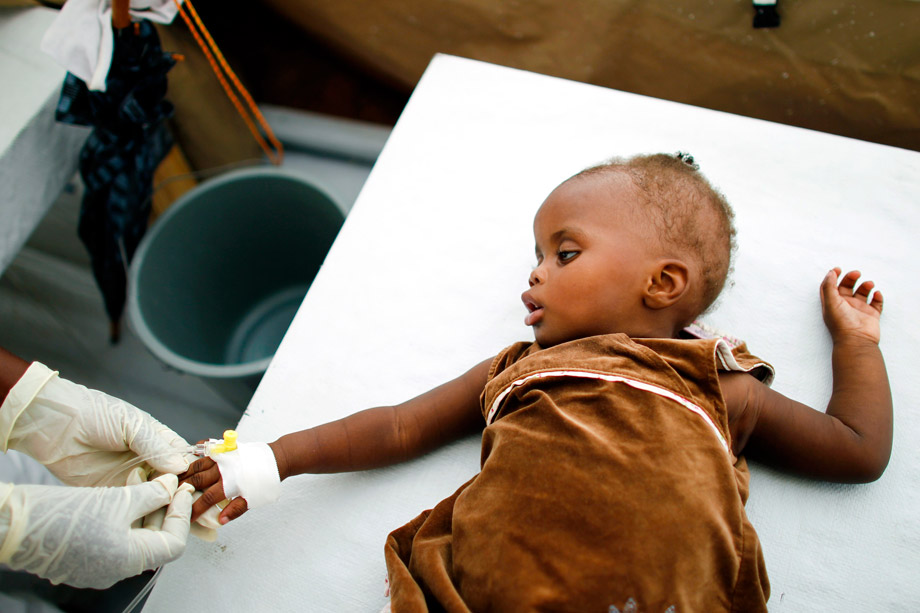 130225_FOR_cholera14 A Haitian girl receives an intravenous drip at a cholera treatment center of Doctors Without Borders in Port-au-Prince, Jan. 10, 2011.
