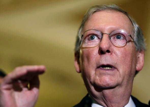 U.S. Senate Minority Leader Mitch McConnell (R-KY) speaks to reporters at the U.S. Capitol in Washington September 24, 2013. 