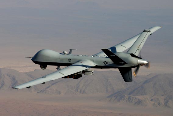 An MQ-9 Reaper, armed with GBU-12 Paveway II laser guided munitions and AGM-114 Hellfire missiles, piloted by Col. Lex Turner during a combat mission over southern Afghanistan.