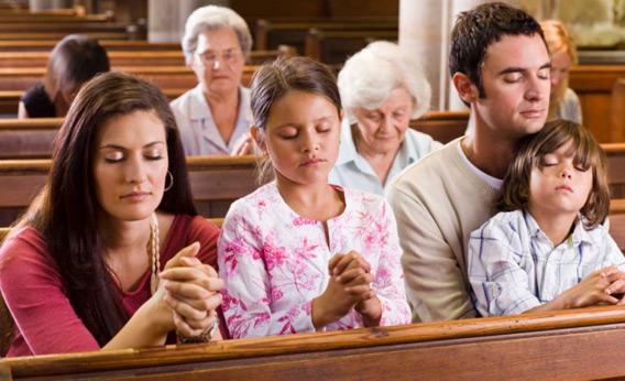 People praying in a church.