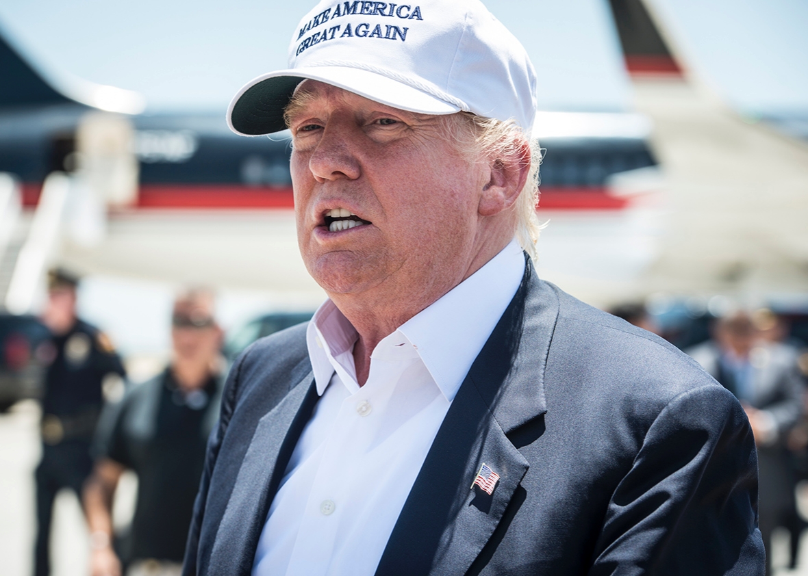 Republican Presidential candidate and business mogul Donald Trump exits his plane during his trip to the border on July 23, 2015 in Laredo, Texas.