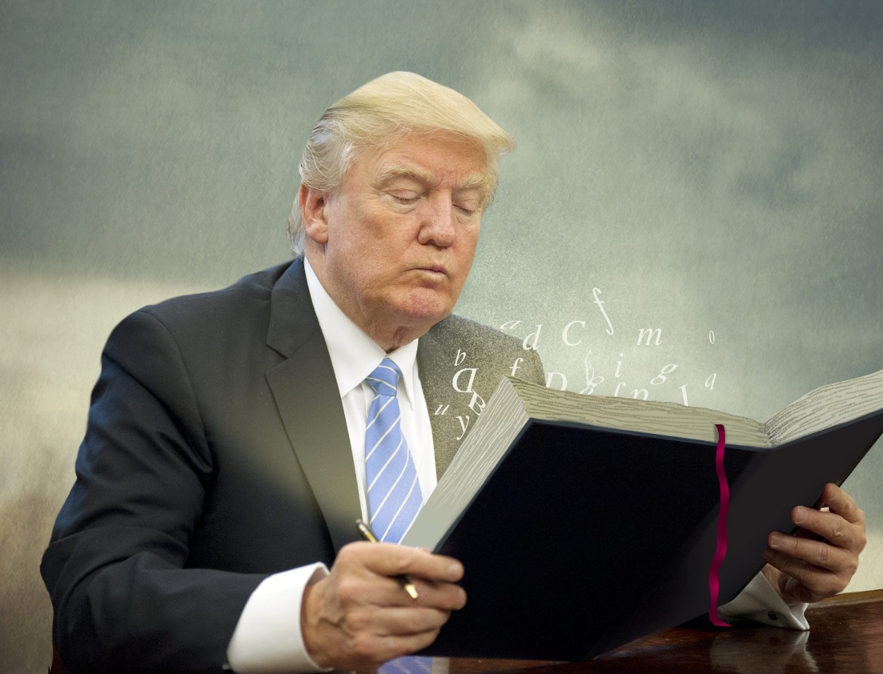Donald Trump tries to read a book.