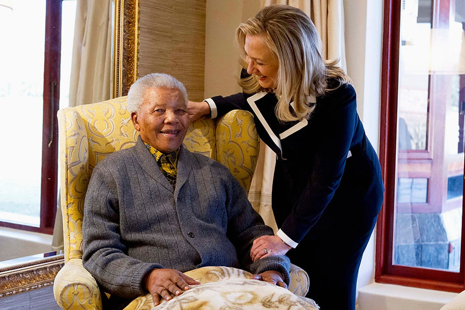 U.S. Secretary of State Hillary Clinton meets with Nelson Mandela, 94, former president of South Africa, at his home in Qunu, South Africa, August 6, 2012.