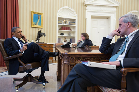 President Obama (L) talks on the phone and Chief of Staff Denis McDonough. President Obama (L) talks on the phone and Chief of Staff Denis McDonough.