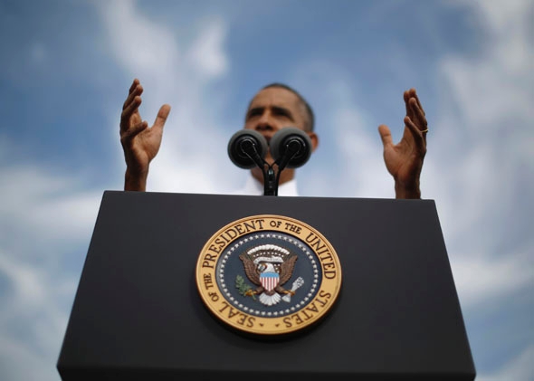 U.S. President Barack Obama delivers remarks on the government funding impasse at M. Luis Construction, a local small business in Rockville, Maryland, near Washington, October 3, 2013. 