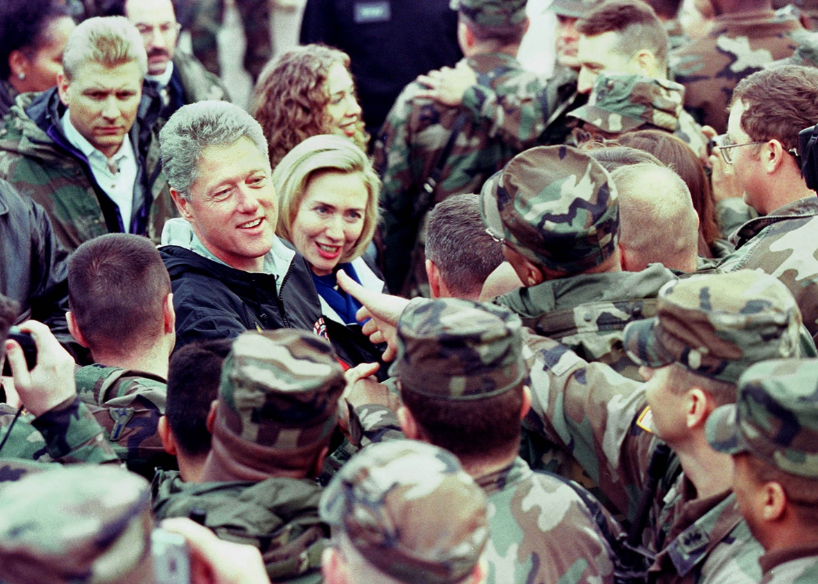 President Bill Clinton and first lady Hillary Rodham Clinton meet with American soldiers on their arrival in Tuzla, Bosnia, on Dec. 22, 1997.