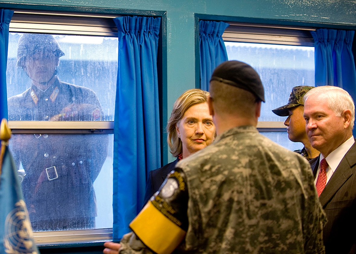 Secretary of State Hillary Clinton and Secretary of Defense Robert Gates visit the U.N. truce village building that sits on the border of the Demilitarized Zone on July 21, 2010, in Panmunjon, South Korea.