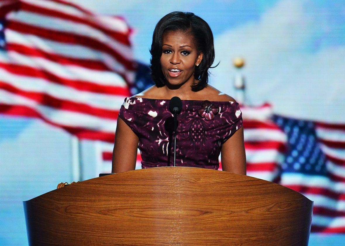 First Lady Michelle Obama introduces her husband US President Barack Obama as he is to deliver his acceptance speech to run for a second term as president at the Time Warner Cable Arena in Charlotte, North Carolina, on September 6, 2012 on the final day of the Democratic National Convention.  