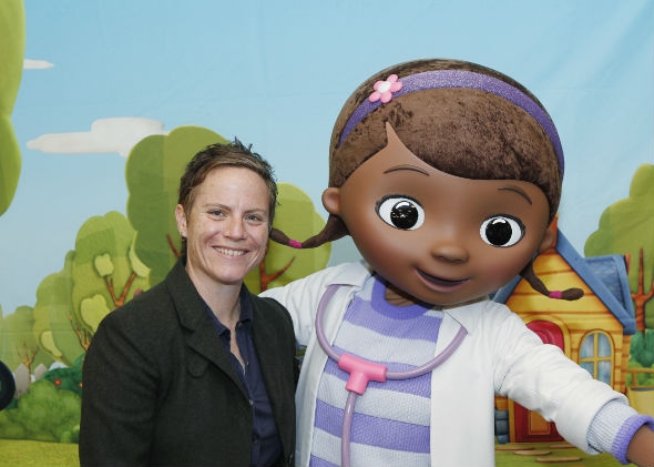 Chris Nee, creator and executive producer of Doc McStuffins, alongside the doctor herself.