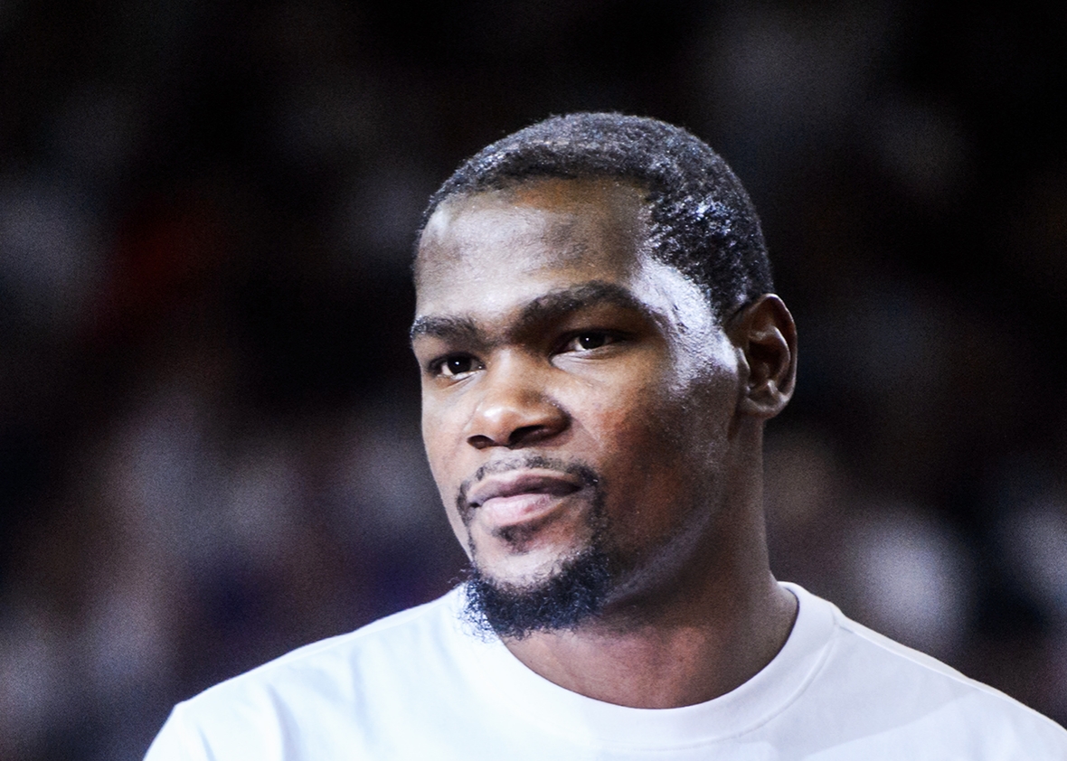 160712_HUAL_bonus US NBA basketball player Kevin Durant #35 of the Oklahoma City Thunder looks on at a promotional event in Hong Kong on July 12, 2016.