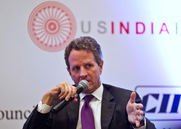 153794954-treasury-secretary-timothy-geithner-gestures-as-he