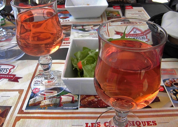 Two glasses of ros&eacute; wine.