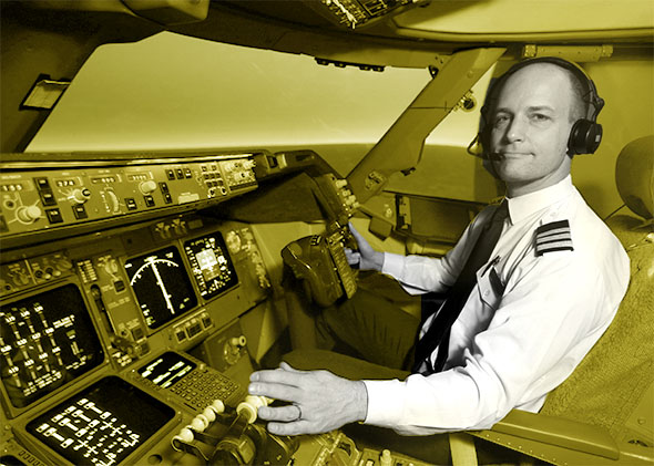 Mark Vanhoenacker in the cockpit of a Boeing 747-400.