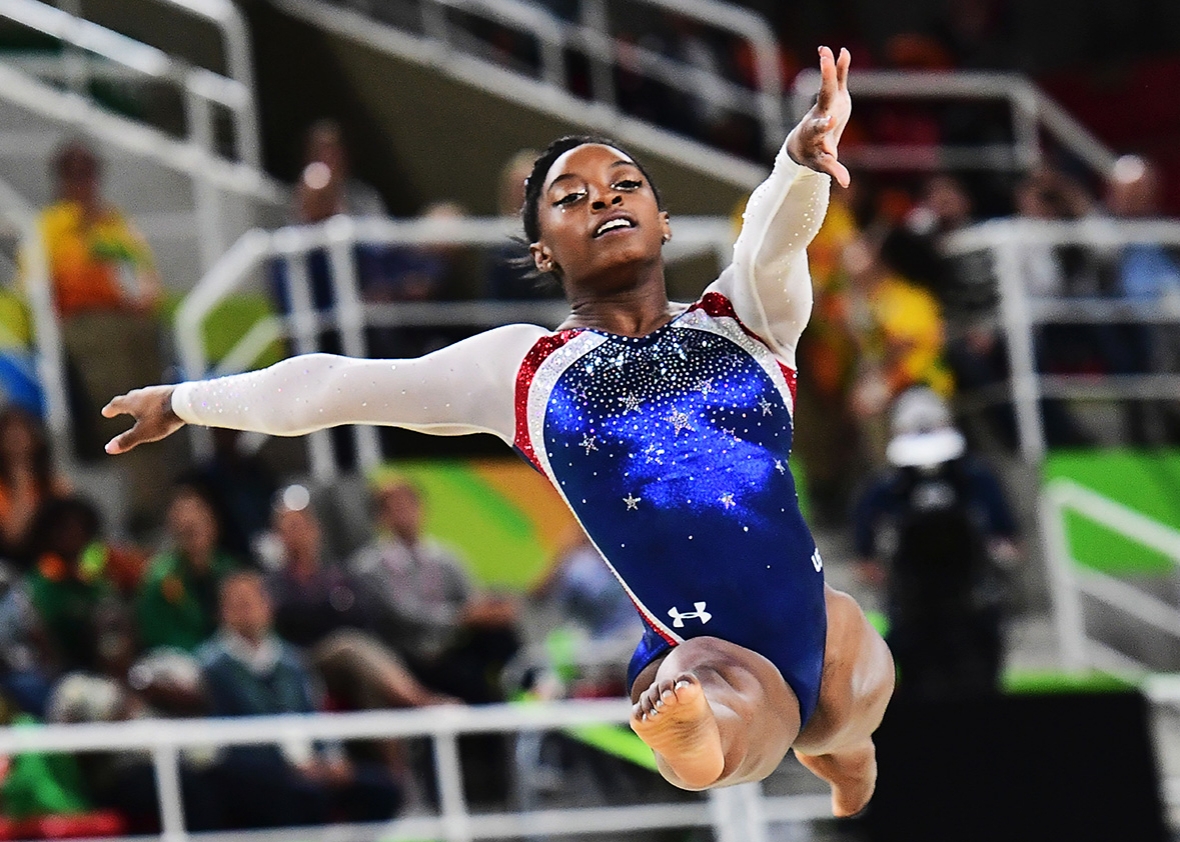 US gymnast Simone Biles competes in the floor event of the women's individual all-around final of the Artistic Gymnastics at the Olympic Arena during the Rio 2016 Olympic Games in Rio de Janeiro on August 11, 2016. 