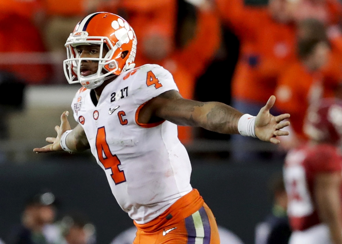 Quarterback Deshaun Watson #4 of the Clemson Tigers celebrates after throwing a 2-yard game-winning touchdown pass during the fourth quarter against the Alabama Crimson Tide to win the 2017 College Football Playoff National Championship Game 35-31 at Raymond James Stadium on January 9, 2017 in Tampa, Florida.  