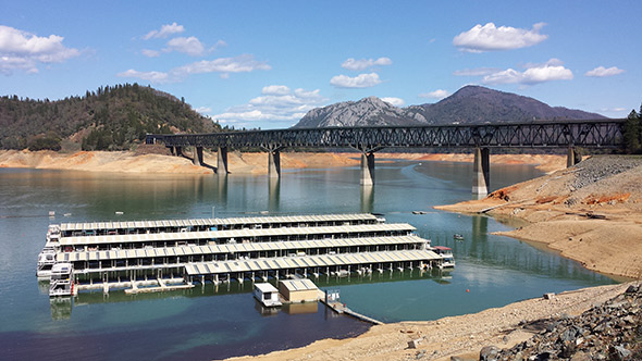 Shasta Lake, in Northern California, is only half full right now. It was built as the centerpiece of the Central Valley Project, supplying water to farmers hundreds of miles away.