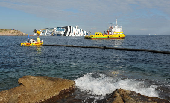 Cruise ship Costa Concordia lies stricken off the shore of the island of Giglio.
