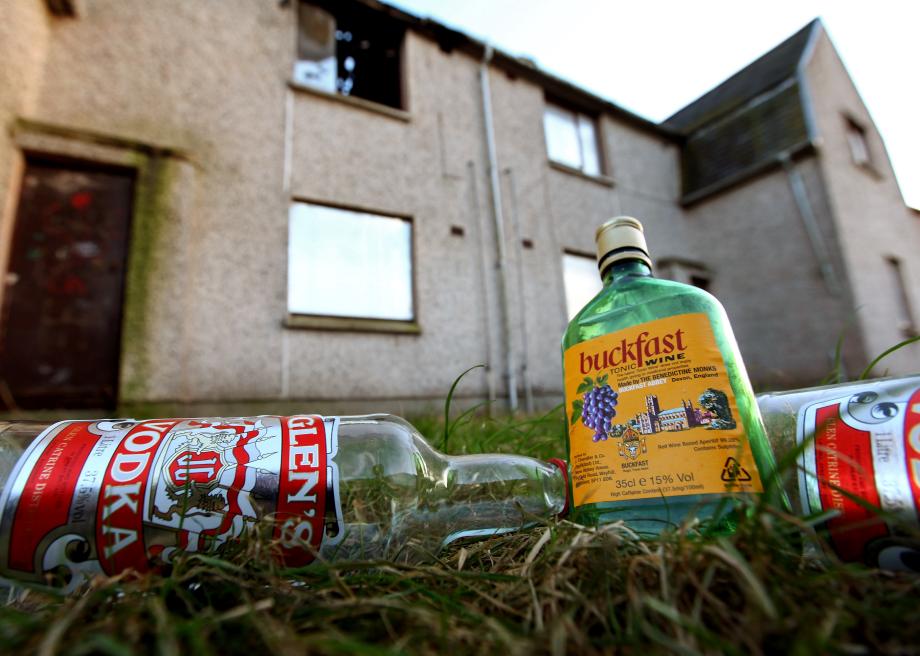 96552688-empty-bottles-of-vodka-and-buckfast-lay-outside-disused