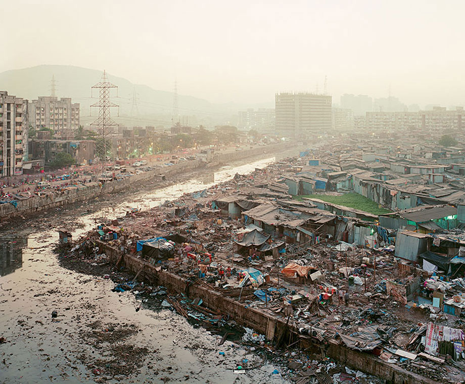 View of several hundred demolished homes at the Lallubhai Compound in the Mankhurd section of Mumbai in December of 2011. The area, which contains many resettlement buildings where the city has relocated former residents of demolished squatter communities, is also home to it's own informal settlements. Residents started rebuilding their homes hours after the city demolished them.