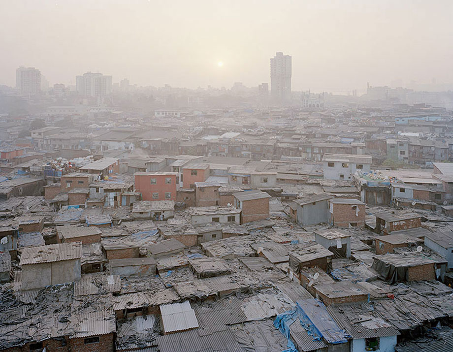 Dharavi is an informal community in Mumbai. It is built on a former Mangrove swamp that later was settled as a fishing village. Now it is home to nearly a million people and thousands of businesses and factories. The area has been threatened by several redevelopment plans. (It's no longer the largest slum in Asia, but I still see that quoted in the media a lot.)