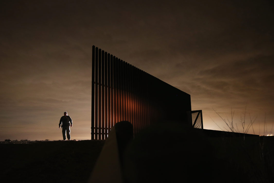 La Joya, Texas  U.S. Border Patrol agent Sal De Leon stands near a section of the U.S.- Mexico border fence while stopping on patrol on April 10, 2013 in La Joya, Texas. According to the Border Patrol, undocumented immigrant crossings have increased more than 50 percent in Texas' Rio Grande Valley sector in the last year. Border Patrol agents say they have also seen an additional surge in immigrant traffic since immigration reform negotiations began this year in Washington D.C. Proposed refoms could provide a path to citizenship for many of the estimated 11 million undocumented workers living in the United States. 