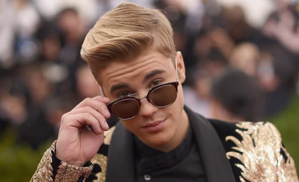 472253196-singer-justin-bieber-attends-the-china-through-the 472253196-singer-justin-bieber-attends-the-china-through-the