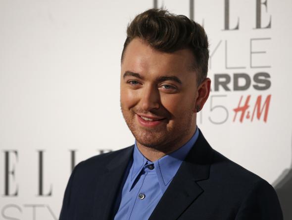 464316722-british-singer-sam-smith-poses-for-photographers-on-the