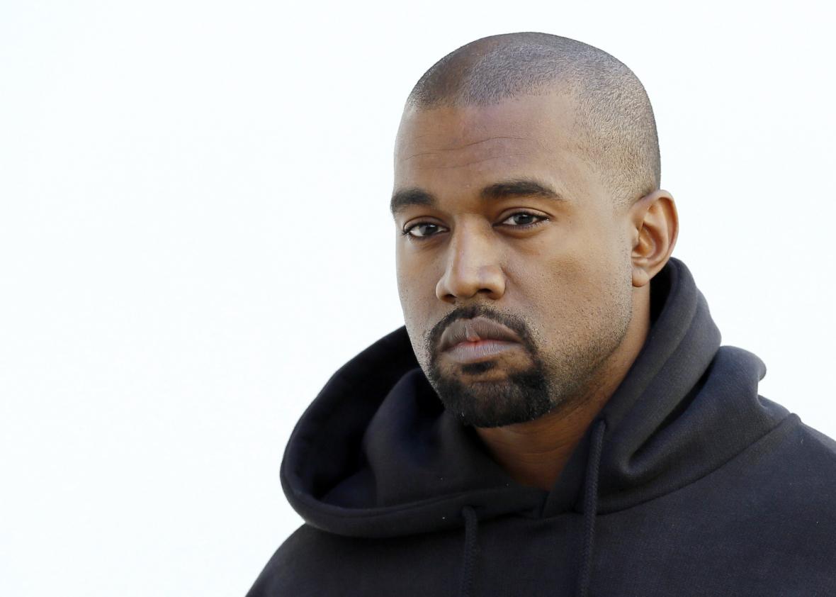 465349272-american-rapper-kanye-west-poses-before-christian-dior