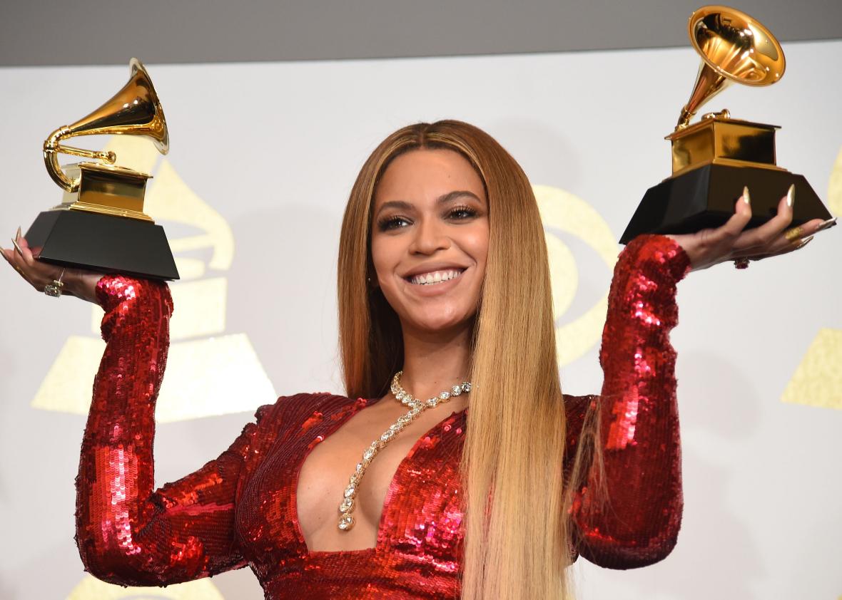 635010804-singer-beyonce-poses-with-her-grammy-trophies-in-the 635010804-singer-beyonce-poses-with-her-grammy-trophies-in-the