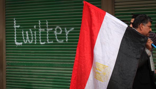 108817113-shop-in-tahrir-square-is-spray-painted-with-the-word