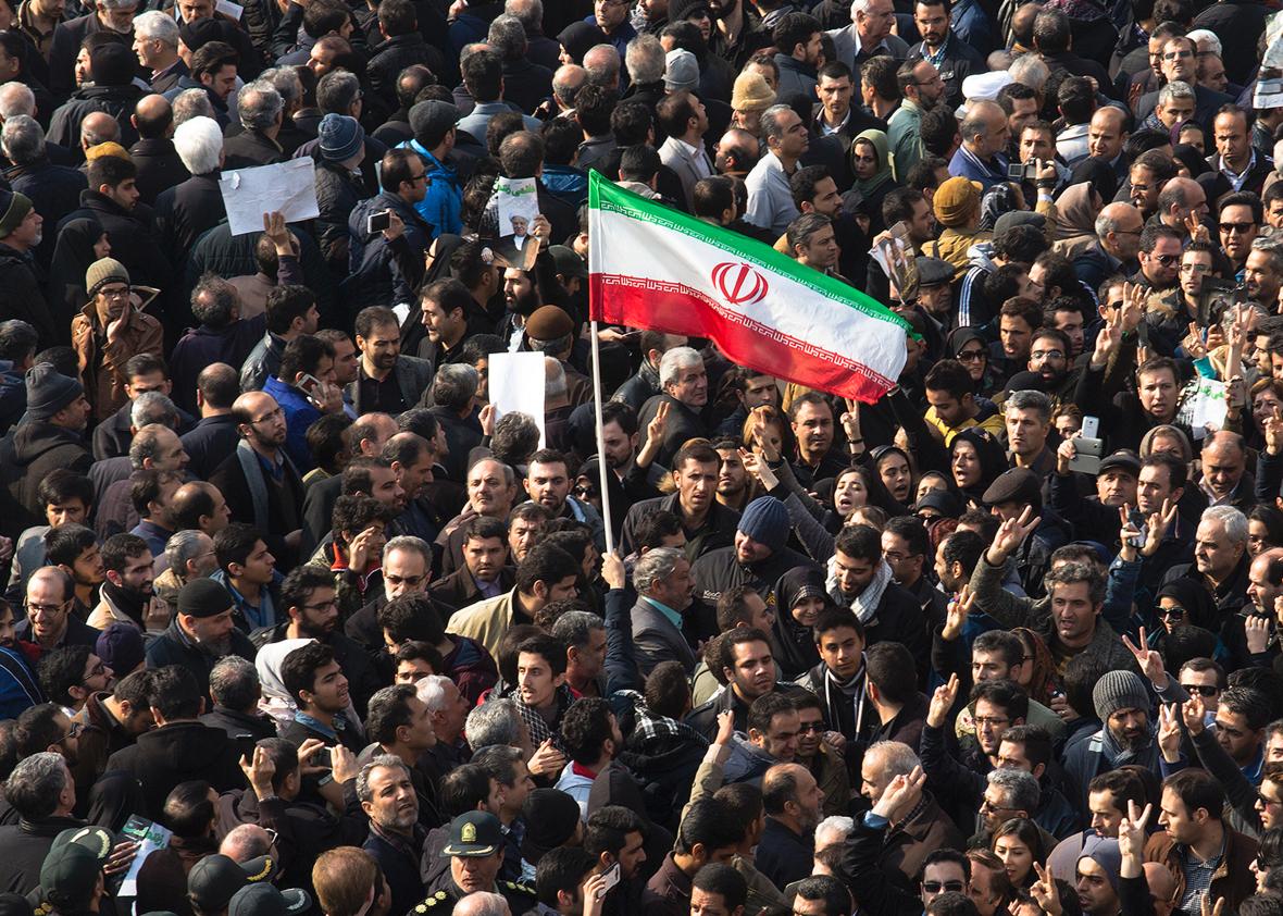 631391956-mourners-attend-the-funeral-of-former-iranian-president
