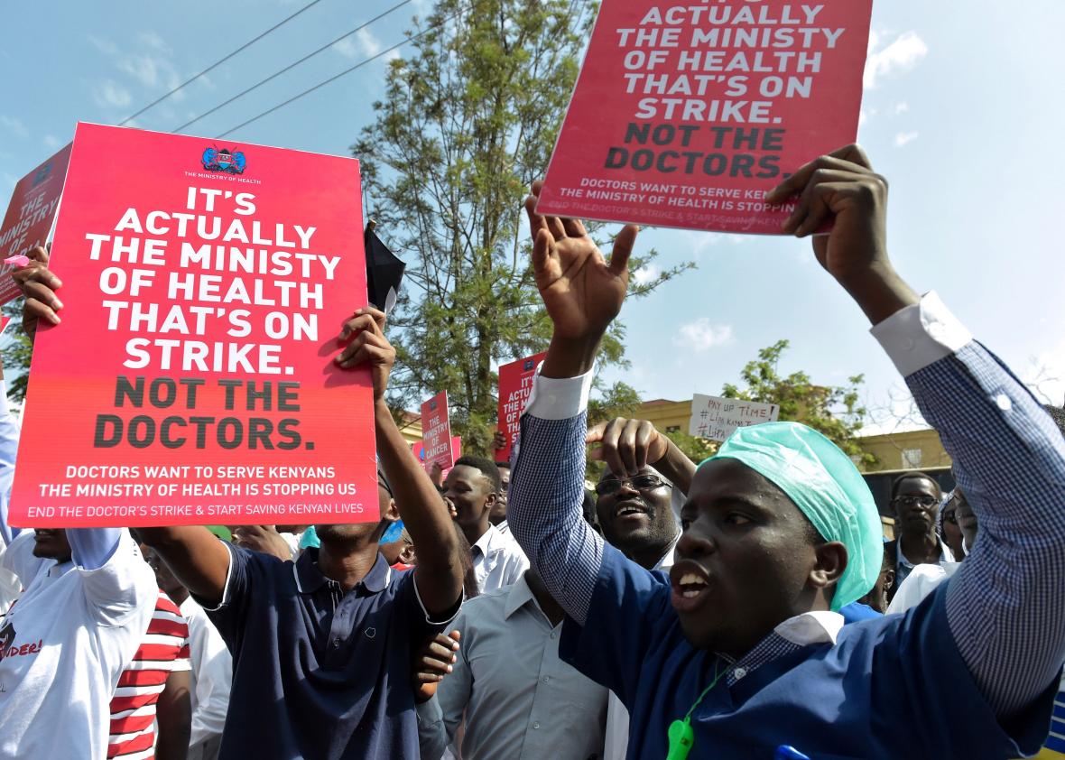 632752650-kenyan-doctors-shout-slogans-and-hold-placards-outside