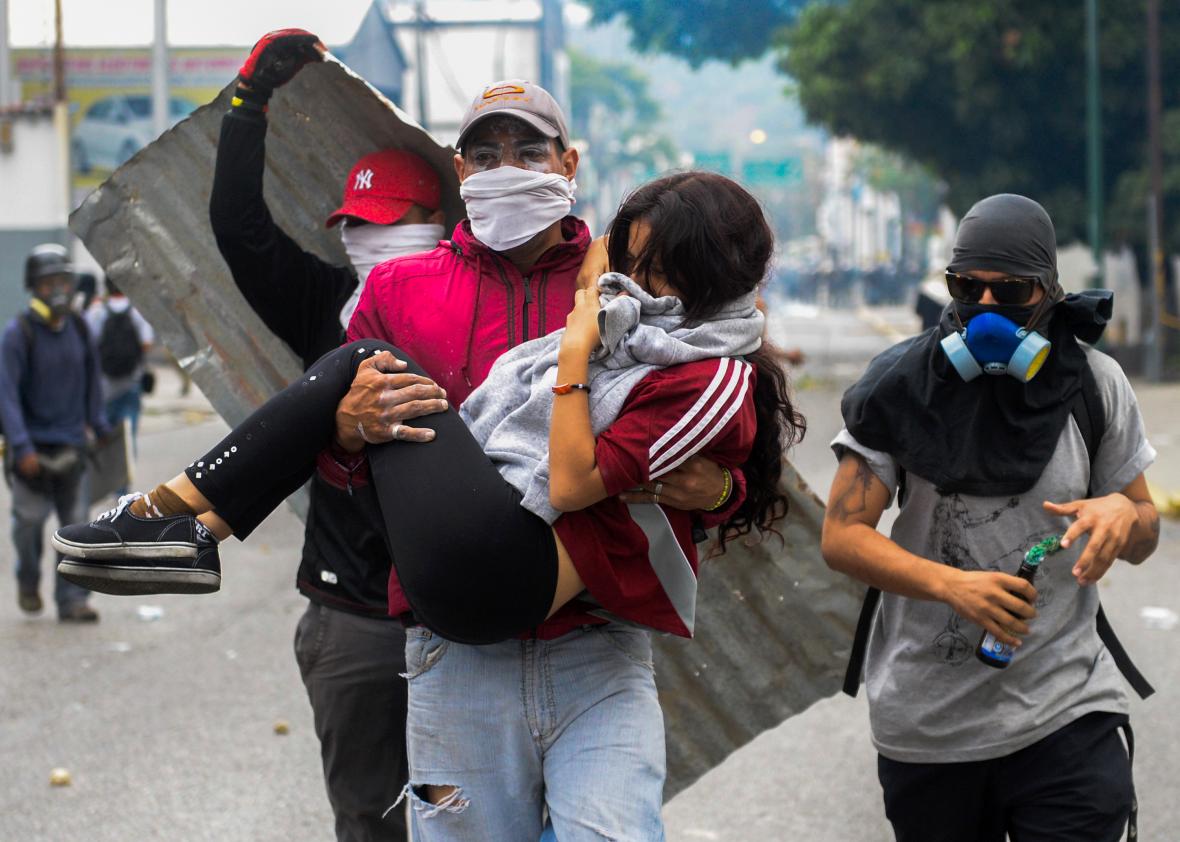 666985412-young-woman-who-was-overcome-by-tear-gas-shot-by-tiot 666985412-young-woman-who-was-overcome-by-tear-gas-shot-by-tiot
