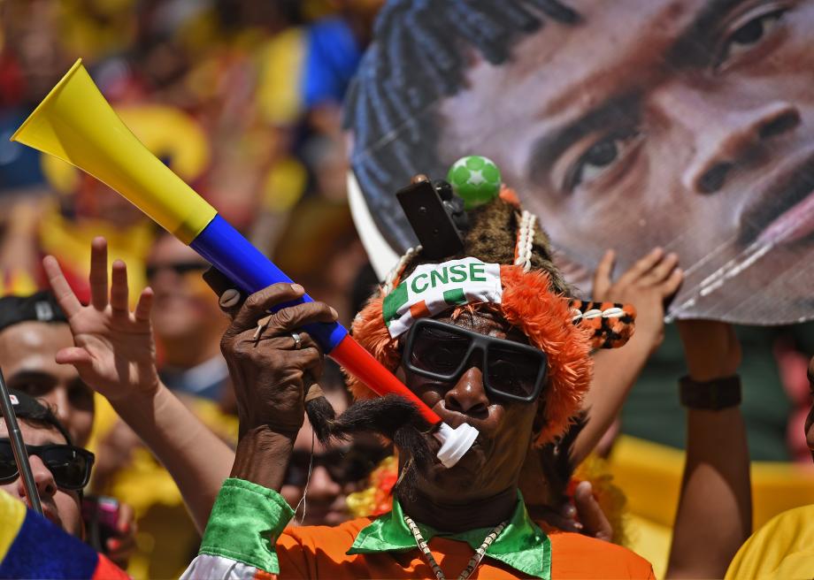 450864604-an-ivorian-fan-blows-a-vuvuzela-before-the-start-of-the